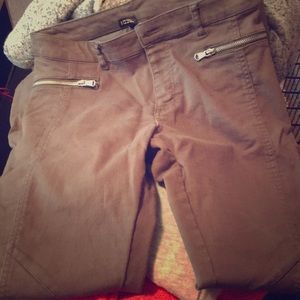 Army green jeans with zippers